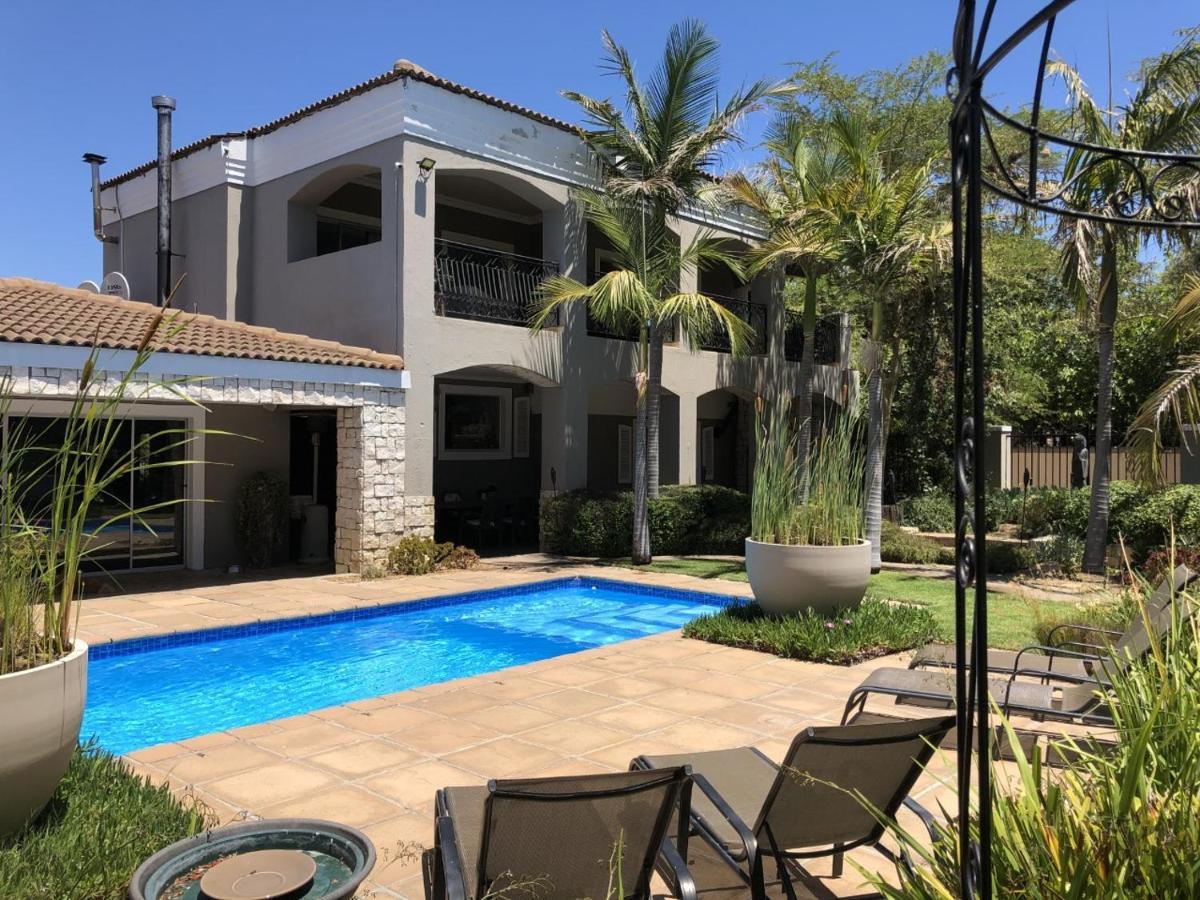 African Palm Cottage And Guesthouse Дурбанвілл Екстер'єр фото