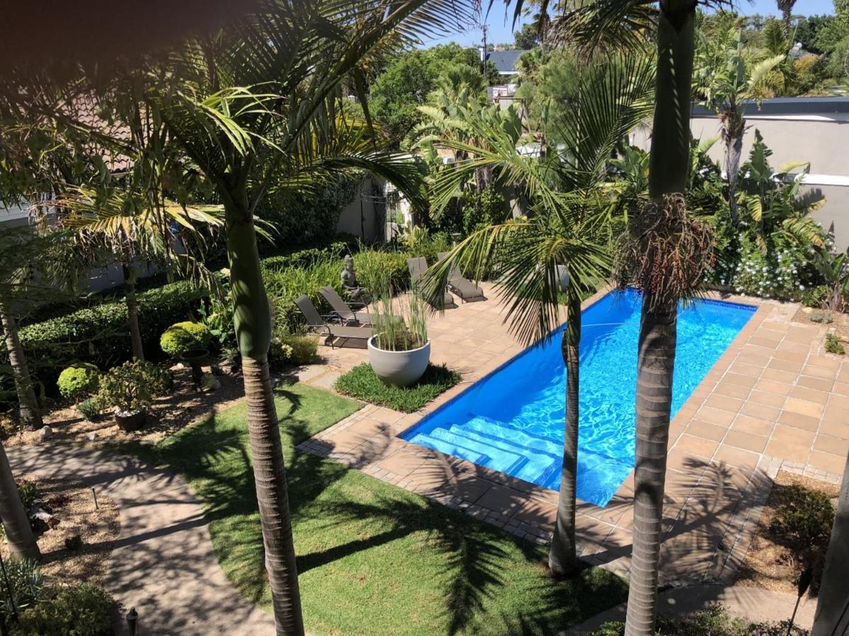 African Palm Cottage And Guesthouse Дурбанвілл Екстер'єр фото