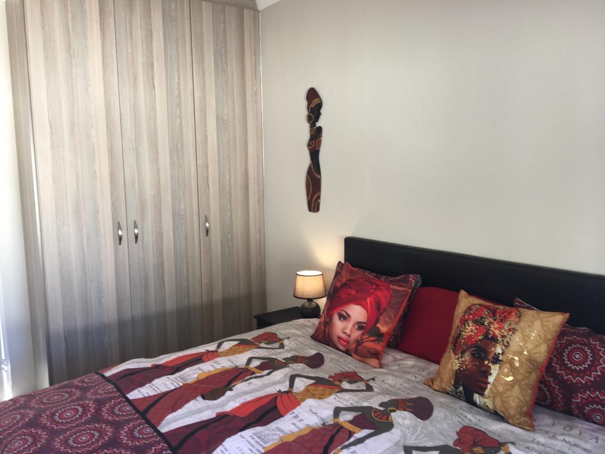 African Palm Cottage And Guesthouse Дурбанвілл Екстер'єр фото